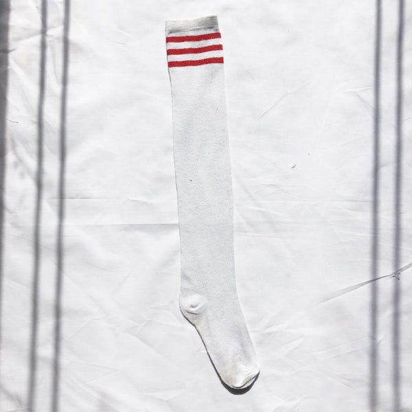 High-Cut Stripe Socks | Red Stripe Thigh High Flat Lay